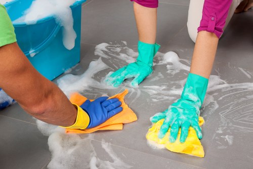 Cleaning staff checking room access and equipment before work