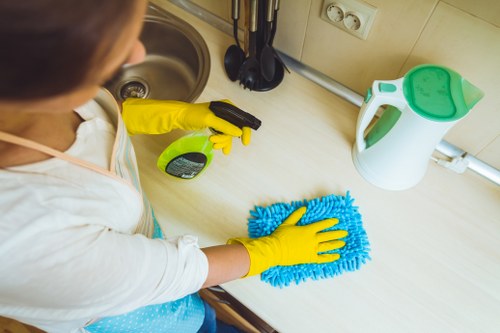 Sanitised desks and meeting room during office cleaning